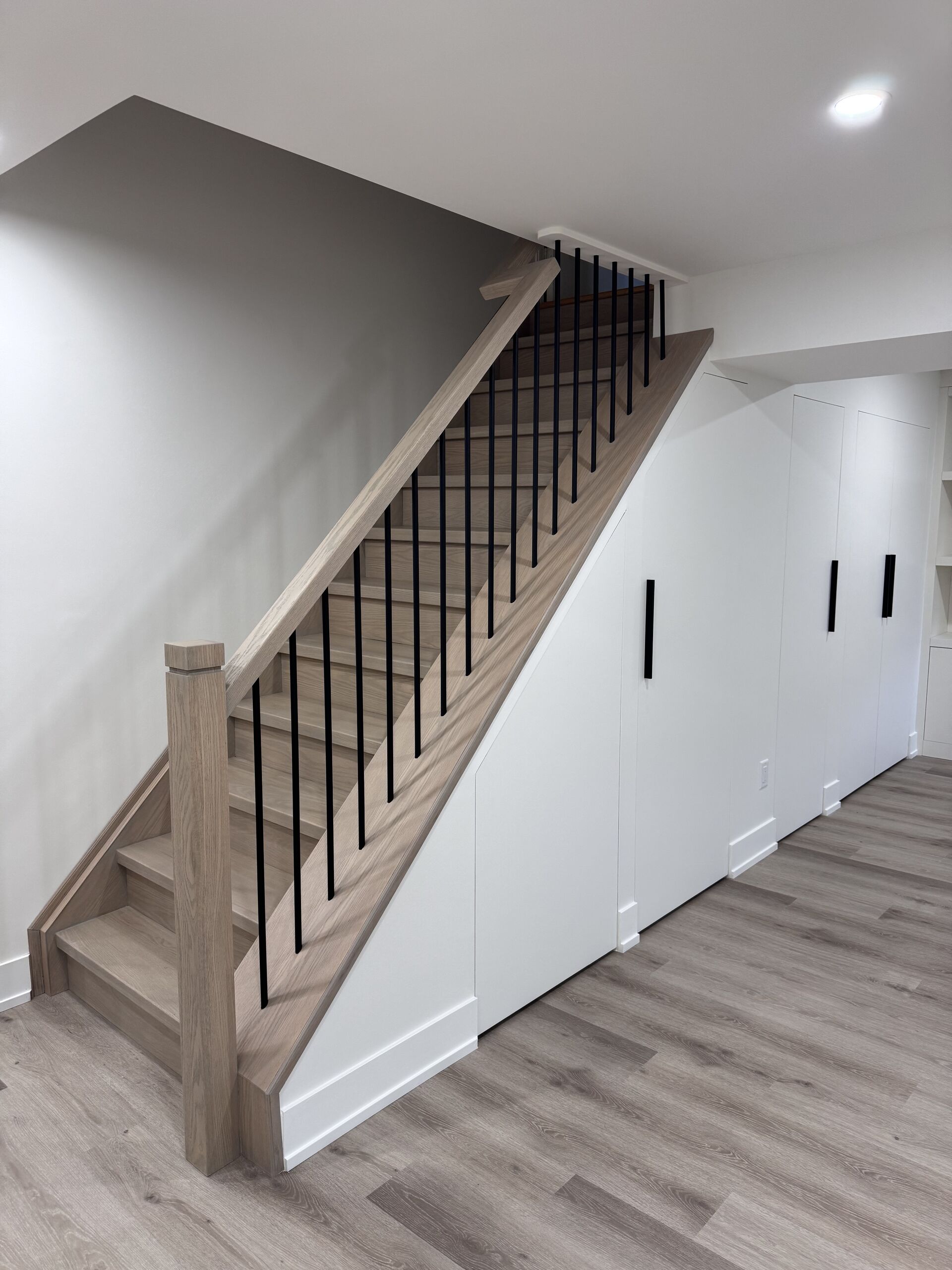 Custom staircase and railings — whole-home renovation in the GTA